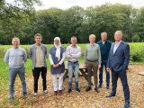 Groepsfoto met de deelnemers en de docent